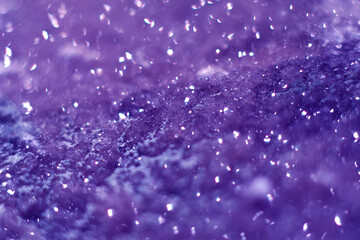 Beautiful druse of natural purple mineral amethyst close-up. Semiprecious stone background. Gem crystals.