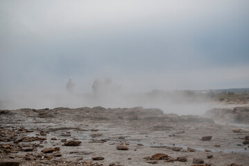 Landscape of steam coming off of Geysir Golden Circle Iceland