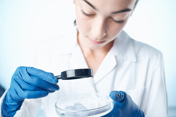Fototapeta premium female doctor chemical solutions biologist research study Studio