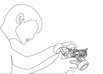 smart student working on electronic robot car. science and technology model car making. scientific technology development concept