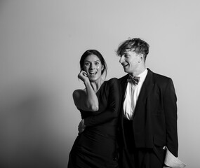 Portrait of beautiful sensual couple in elegant clothes posing. Elegant dress. Couple. 
