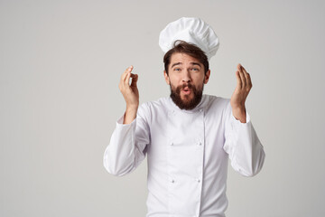 bearded man work uniform profession kitchen stuff light background