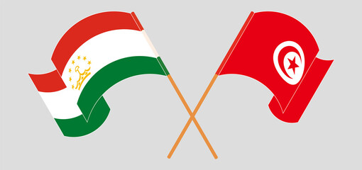 Crossed flags of Tajikistan and Tunisia. Official colors. Correct proportion