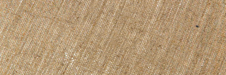 simple linen background: the reverse side of the primed canvas stretched over the frame, close, toning