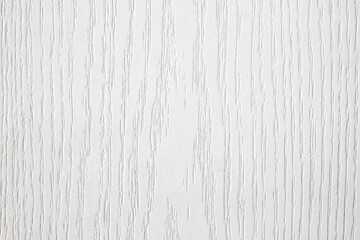 White, wooden background with a visible texture