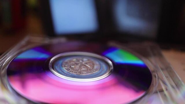 A vintage colorful mini disk for a camcorder with background bokeh