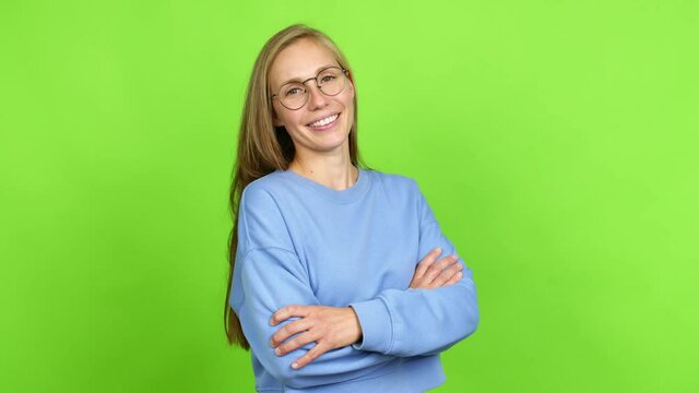 Young blonde girl with glasses and happy. Green screen chroma key