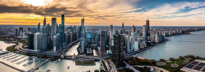 Fototapeta premium Aerial drone photo - Skyline of Chicago Illinois at sunset. 