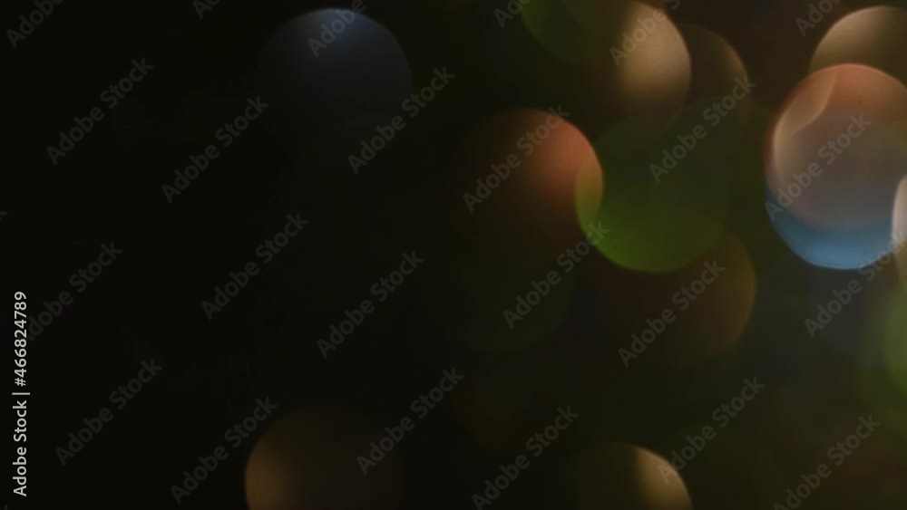 Wall mural soft round bokeh moves diagonally upward. bokeh hd loop. movement and shimmers of brown bokeh with h