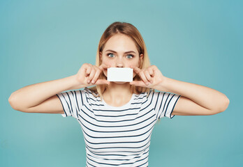 Fototapeta premium pretty woman with a business card in hand Lifestyle Studio