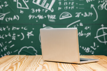 Education background concept. Laptop with Mathematical formula chalkboard. Banner design copy space.