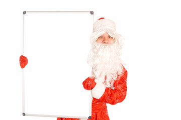 Santa Claus with white poster with free space. Template for New Year advertising.