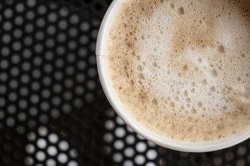 Top view of frothy latte coffee