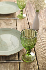 Simple table setting on wooden background