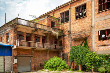 Abandoned red brick factory building in a Chinese city