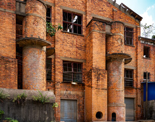 Abandoned red brick factory building in a Chinese city