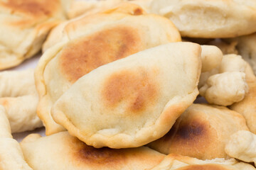 baked vegan dumplings closeup selective focus