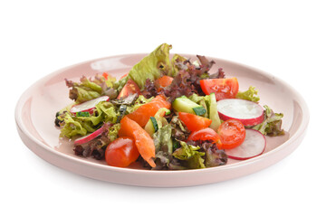 Delicious salad with salmon and vegetables in plate on white background