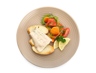 Fototapeta na wymiar Plate of tasty sea bass fish with vegetables on white background
