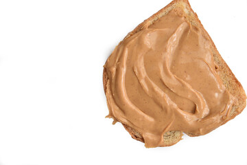 Peanut butter on a slice of bread