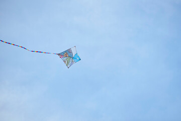 Kite flying in blue sky