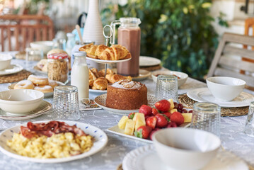 Assorted desserts and drinks served on table