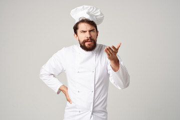 male cook kitchen Job hand gestures light background