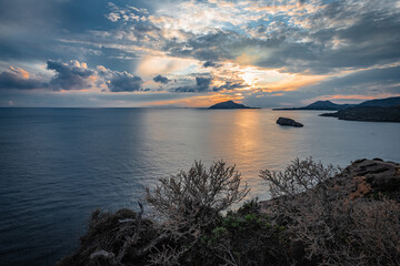 Fototapeta premium Sunset on the Aegean Sea in thunderclouds