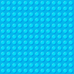 Block plastic toys seamless pattern. Blue background. Designer. Vector cartoon illustration
