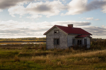 Fototapeta na wymiar Abandoned House By Swamp Lake