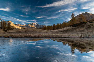 The frozen lake in the wild Alps, fine art landscape