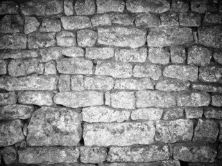 grey closeup of granite stone wall background texture black white color
