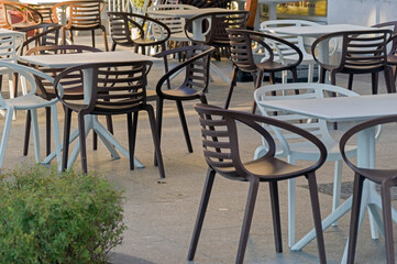 chairs and tables in the summer cafe