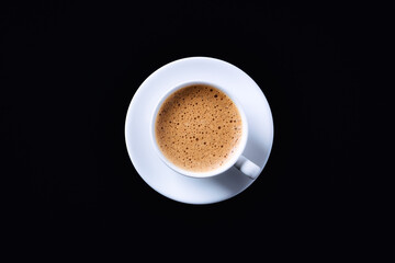 Cup of coffee on black background. Top view. Copy space.	