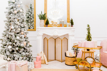 New Year interior in a photo studio. Christmas tree near the fireplace