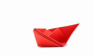 red paper boat isolated on white background