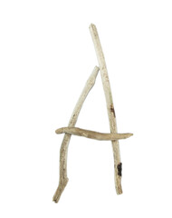 Obraz premium letter E made of dry wood isolated over white background, copy space.