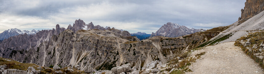 Fototapeta premium Panoramic view of the famous peaks of the Dolomites, Tre Cime di Lavaredo National Park, Dolomiti Alps, South Tyrol, Italy