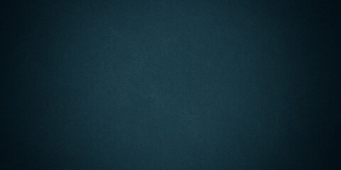 Dark blue background texture with black vignette in old vintage grunge textured border design, dark elegant teal color wall with light spotlight center