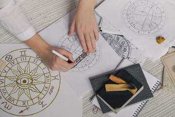 Astrology. Astrologer calculates natal chart and makes a forecast of fate.Tarot cards, Fortune...
