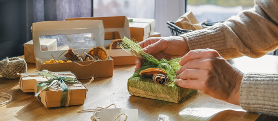 Christmas gift. gift box,zero waste, eco friendly hand made box packaging gifts in kraft paper table, eco christmas holiday concept, Christmas gift wrapping,eco decor banner