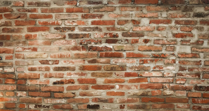 Old rustical wall made of bricks and mortar