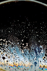 macro of soap bubbles made with dish soap on black background
detergent bubbles. Imitation of an unknown planet. Children's entertainment. Science fiction.
macro of soap bubbles like Planet, ocean wav