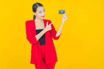 Portrait beautiful young asian woman smile with credit card