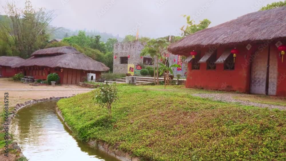 Poster The narrow creek and adobe houses of Santichon Yunnan village, Pai, Thailand