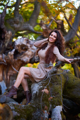 Beautiful woman posing in autumn colors