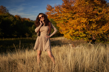 Autumnal portrait of a beautiful woman outdoors