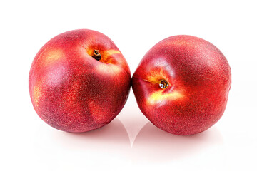 ripe nectarine peach fruits isolated on white