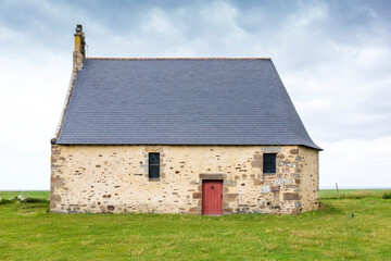 Fototapeta premium Cherrueix France 06-23-2021. Old little chapel Saine Anne de la Greve at Cherrueix. France