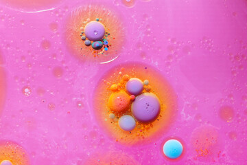 Close up macro shot of Abstract colorful Background Oil and color on water surface.
